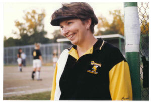 Another common sight in St. Elizabeth -- a smiling coach Diane Juergensmeyer, whose teams won 18 conference titles.