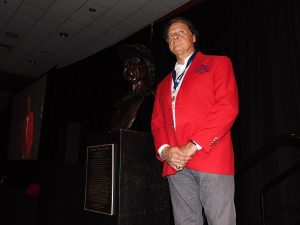 Tony La Russa stands next to the specially commissioned bronze bust that will soon debut on the Legends Walkway. The Hall named La Russa a Missouri Sports Legend on Wednesday.