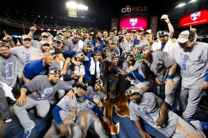 NEW YORK, NY - NOVEMBER 1: Members of the Kansas City Royals take team photo on the field after defeating the New York Mets in Game 5 of the 2015 World Series at Citi Field on Sunday, November 1, 2015 in the Queens borough of New York City. (Photo by Rob Tringali/MLB Photos via Getty Images)