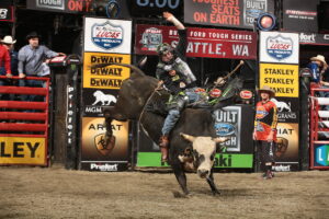 LJ Jenkins rides Bailey Pro Rodeo's Justified for 85 during the first round of the Seattle Built Ford Tough Series PBR. Photo by Andy Watson.