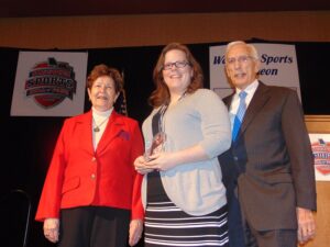 Monique (Willcut) Begley with, on the left, Dr. Mary Jo Wynn and MSHOF Chairman Leon Combs