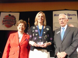 Angie (Bullock) Homeyer with, on the left, Dr. Mary Jo Wynn and MSHOF Chairman Leon Combs