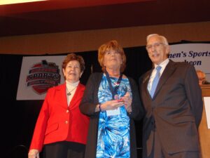 Julie Martin with, on the left, Dr. Mary Jo Wynn and MSHOF Chairman Leon Combs