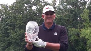 John Cyrus holds the winning trophy from the Masters Division regional of the Callaway Long Drive Series.
