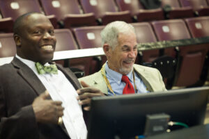 These days, Stuckey (left) handles TV commentary on Bears basketball games with MSHOF Legend Ned Reynolds.